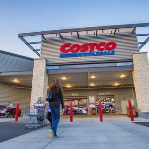 Lady Going Inside Costco Store Wallpaper