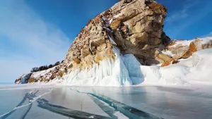 Lake Baikal Snowy Ice Beside The Rock Wallpaper