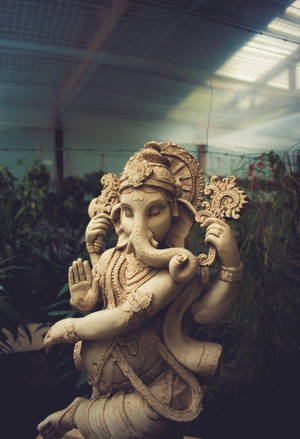 Lalbaugcha Raja Brown Sculpture Wallpaper