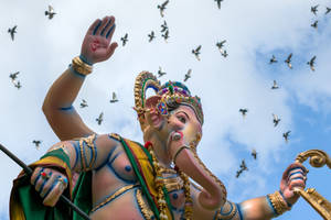 Lalbaugcha Raja Staue Blue Sky Wallpaper