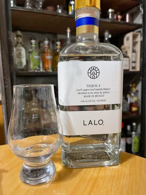 Lalo Tequila Bottleand Glass Wallpaper