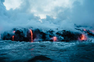 Lava Dripping To Ocean Wallpaper