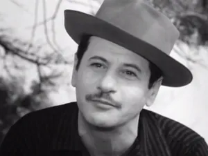 Legendary Actor Eli Wallach Posing With Pork Pie Hat Wallpaper