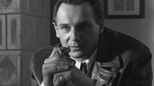 Legendary Actor Liam Neeson In Schindler's List Wallpaper