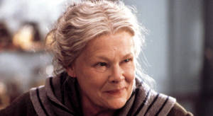 Legendary Actress Judy Dench With A Vibrant Smile Wallpaper