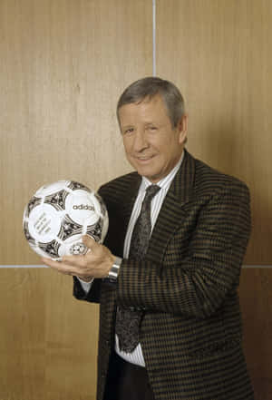 Legendary Footballerwith Adidas Ball Wallpaper