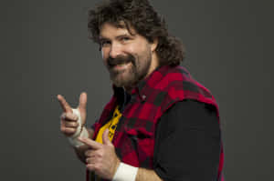Legendary Pro-wrestler Mick Foley In Action Wallpaper
