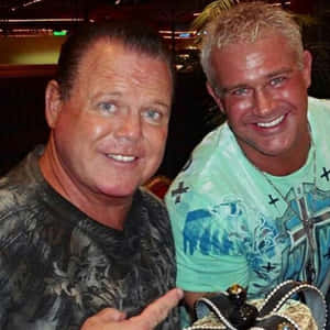Legendary Wwe Commentator Jerry Lawler With Renowned Wrestler Brian Christopher. Wallpaper