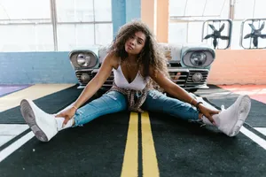 Legs Spread In White Sneakers Wallpaper