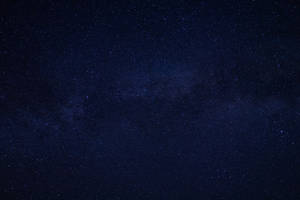 Let Yourself Get Lost In The Mesmerizing Night Sky Of Stars And Darkness. Wallpaper