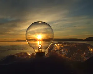 Light Bulb On A Sunset Wallpaper