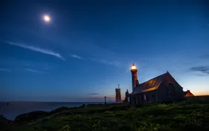 Light House In Moonlight Oceanside Wallpaper