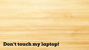 Light Wooden Surface Don't Touch My Laptop Wallpaper