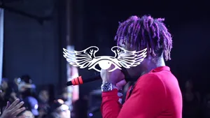 Lil Uzi Vert Putting On An Electrifying Show In Front Of A Hyped-up Crowd Wallpaper