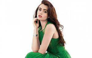 Lily Collins In Green Dress Wallpaper