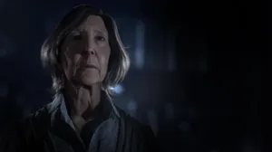 Lin Shaye In Dark Room Wallpaper