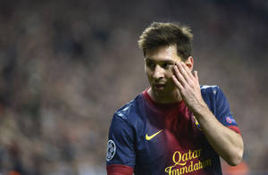 Lionel Messi Hand On Face Wallpaper