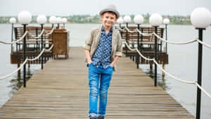 Little Stylish Boy Outdoor Outfit Wallpaper