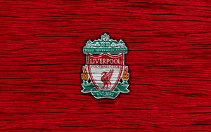 Liverpool 4k Logo On Wood Grain Wallpaper