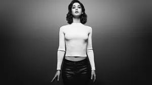 Lizzy Caplan In A Black And White Wallpaper