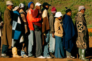 Local Lesotho Individuals In Caps And Jackets Wallpaper