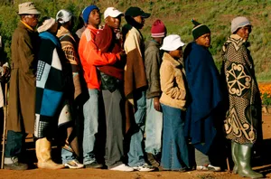 Local Lesotho Individuals In Caps And Jackets Wallpaper