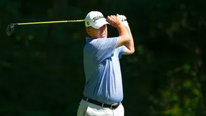 Loren Roberts Arms In Follow-through Position Wallpaper