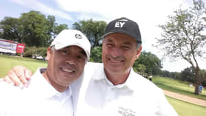 Loren Roberts Interacting With A Fan Wallpaper