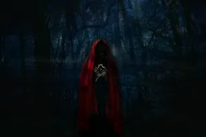 Lost In A Creepy Forest Of Red Hoods Wallpaper