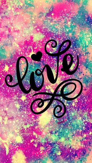Love Is Written On A Colorful Background Wallpaper