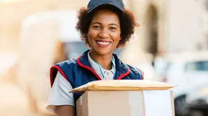 Lovely Lady Carrying Package Wallpaper