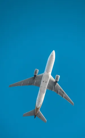 Low Angle Shot Of White Airplane Android Wallpaper