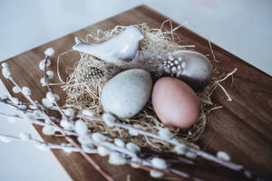 Low Light Photography Of Three Decorative Eggs On Nest Wallpaper