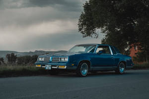 Lowrider Blue 1988 Oldsmobile Wallpaper