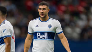 Lucas Cavallini Soccer Player On Field Wallpaper