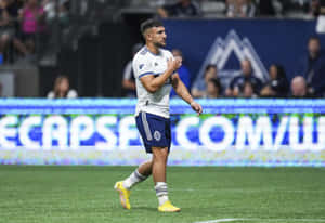 Lucas Cavallini Soccer Player On Field Wallpaper