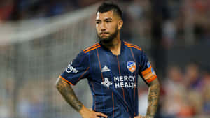 Luciano Acosta In Action On The Football Field Wallpaper