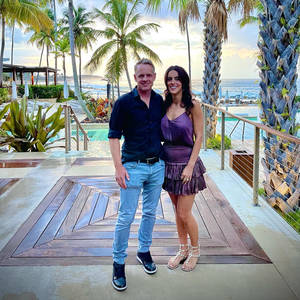 Luke Donald And Wife In A Resort Wallpaper
