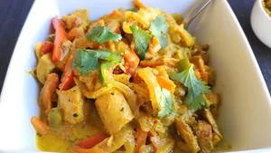 Luscious Yellow Curry Topped With Coriander Wallpaper