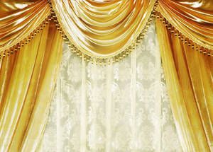 Luxurious Gold Curtains Draped In Elegant Folds Wallpaper