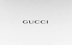 Luxury Defined - Exquisite Gucci Emblem In 4k Resolution Wallpaper