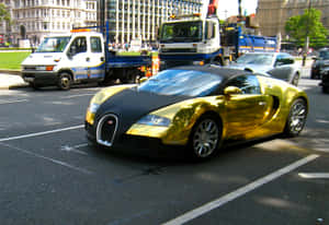 Luxury Meets Power With The Iconic Gold Bugatti Veyron Wallpaper