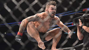 M M A Fighter Celebration Jump Wallpaper