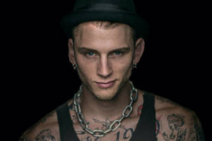 Machine Gun Kelly With Hat Wallpaper