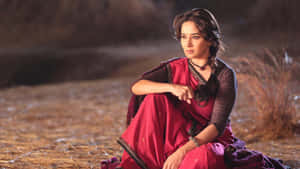 Madhuri Dixit Contemplative Lookin Red Saree Wallpaper