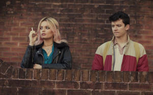 Maeve Wiley Smoking With Otis Milburn Wallpaper