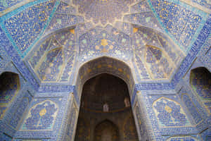 Magnificent Interior Of Shah Mosque In Isfahan Wallpaper
