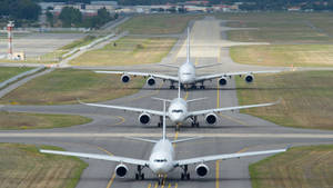 Majestic A380s Ready For Takeoff Wallpaper