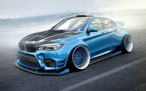 Majestic Bmw X6 M In Icy Blue Color Wallpaper