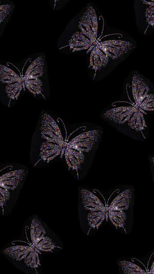 Majestic Dark Butterfly On A Branch Wallpaper